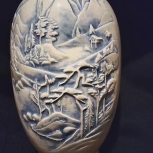 6" VINTAGE POTTERY BLUE VASE W/ EMBOSSED FOREST MO